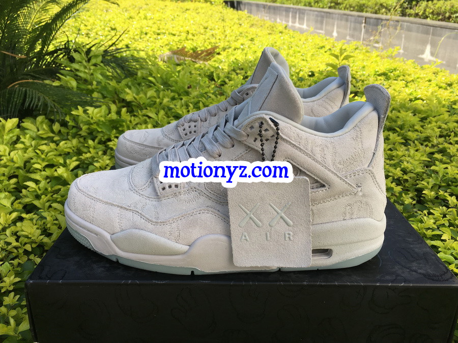 Kaws x Air Jordan 4 Creamy White